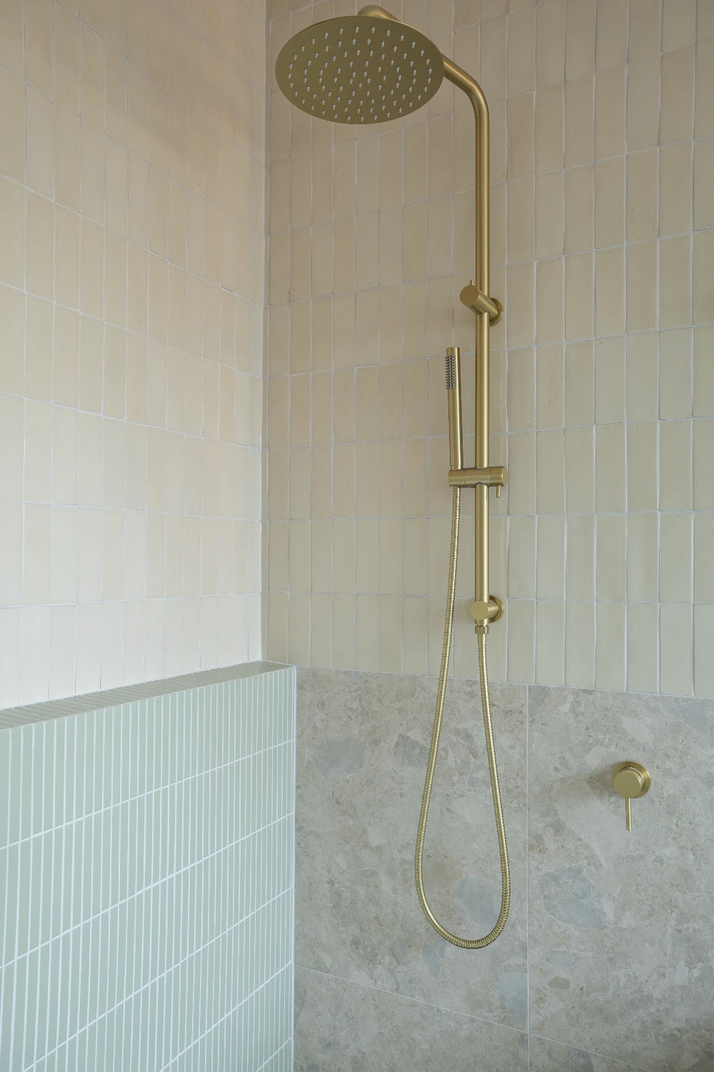Shower — Botanica Kit Kat Soft Sage echoing the powder room green, Zellige Natural carrying through on the side wall.