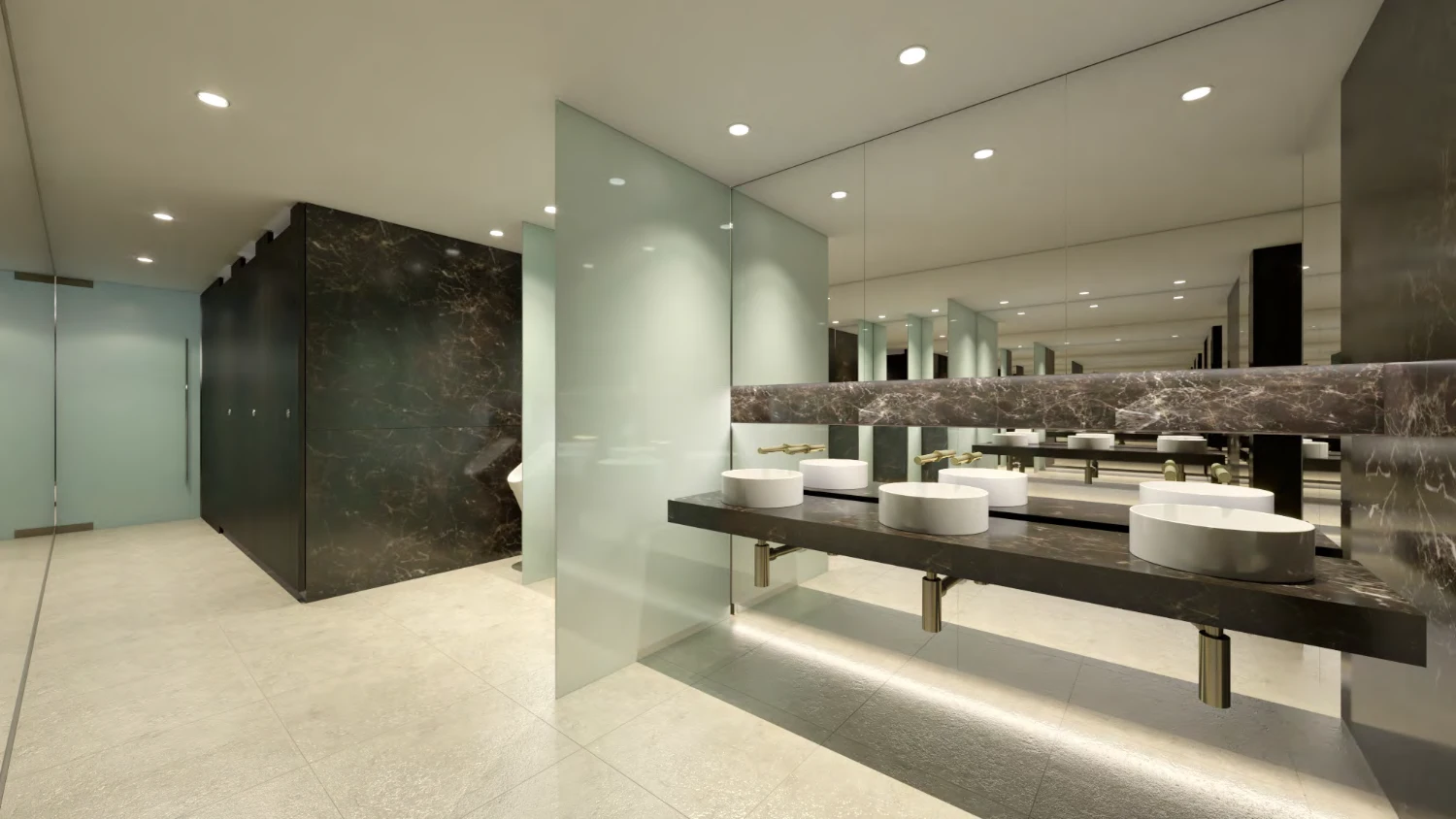 Grosvenor Place male amenities — feature stone vanity with twin basins and brass tapware over a soft, light floor.
